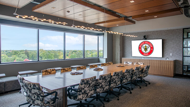 Board Room with Baker Bee on the screen