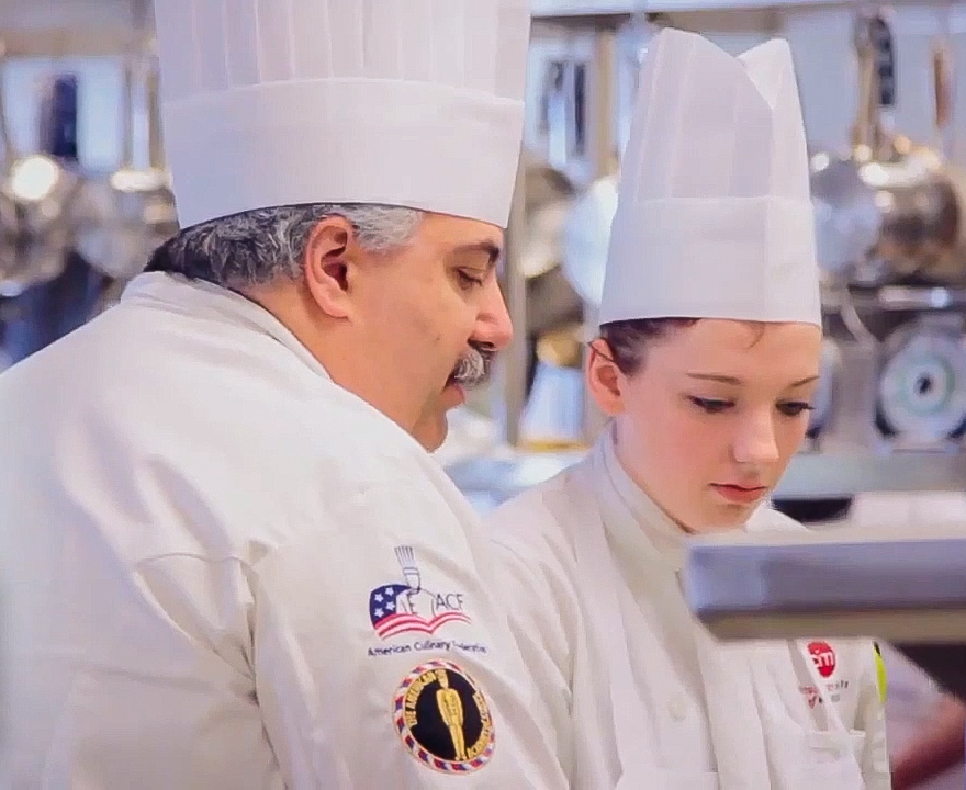 Chef Tom coaching a student